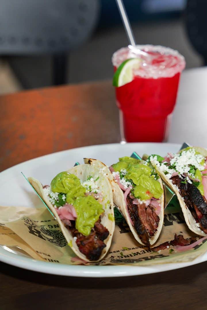 Tacos with guacamole and a margarita at MudHen Brewing Company